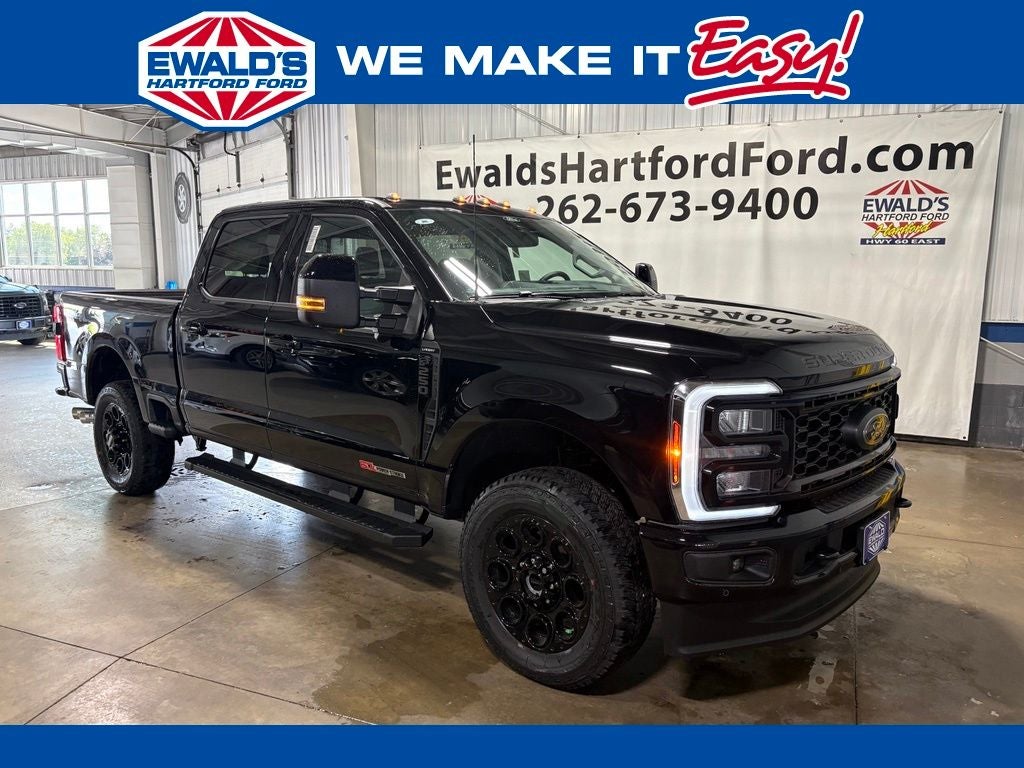 2026 Ford F-250SD Lariat in Black Metallic — front three-quarter view
