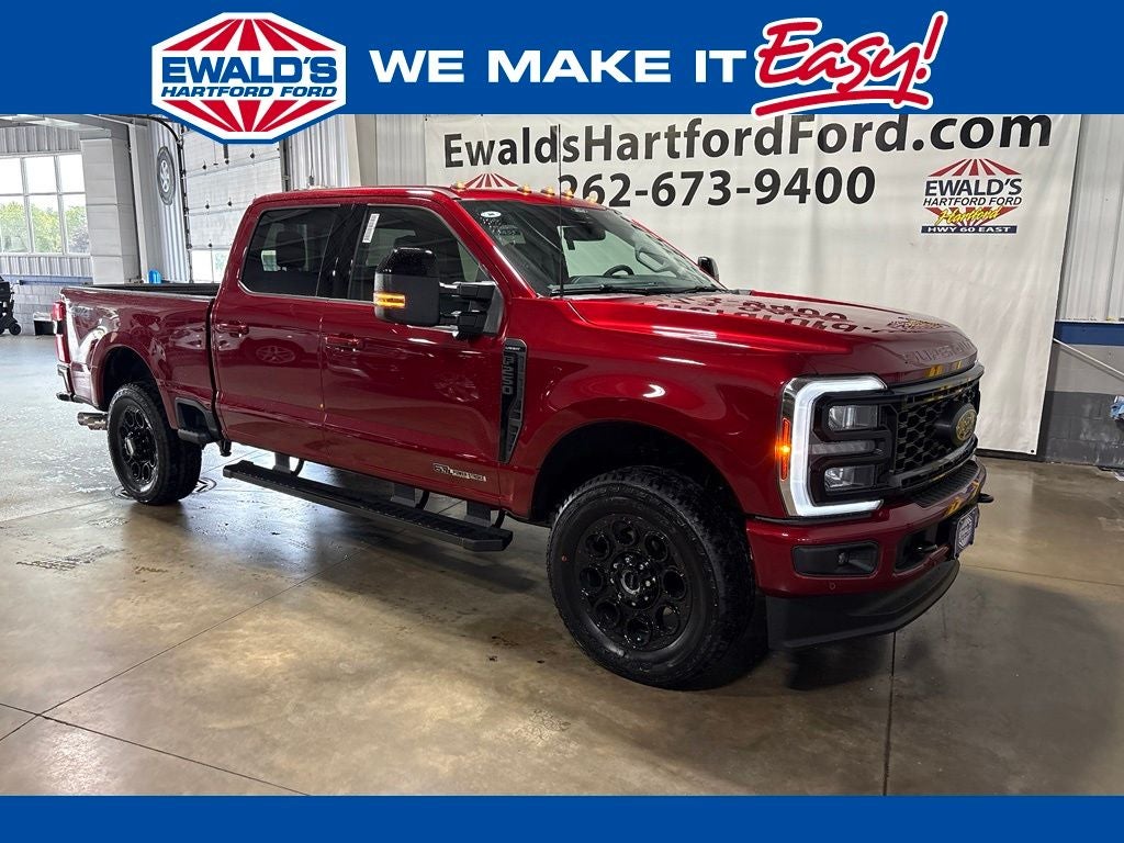 2026 Ford F-250SD Lariat in Ruby Red Metallic — front three-quarter view