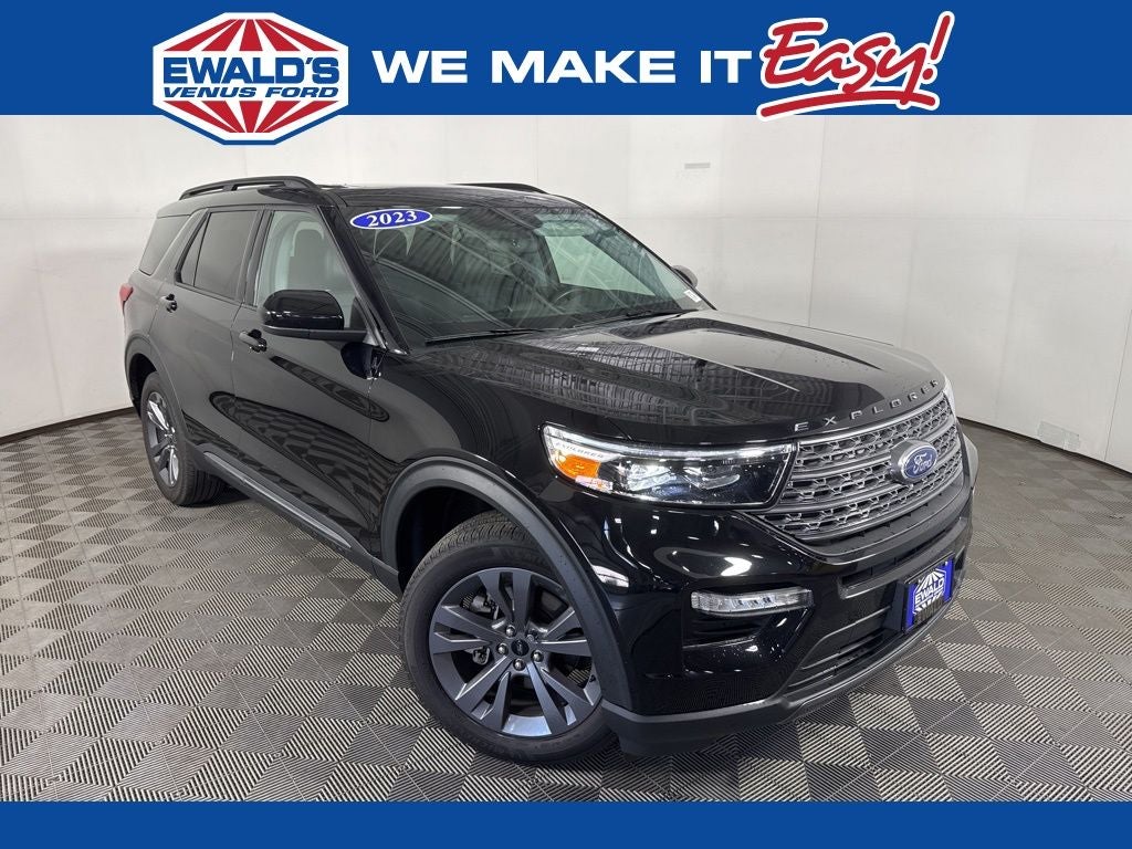 2023 Ford Explorer XLT in Black Metallic — front three-quarter view