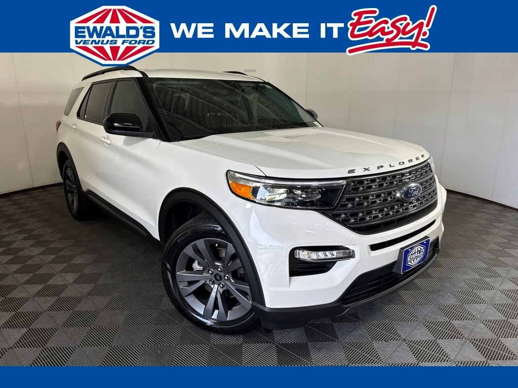 2023 Ford Explorer XLT in White — front three-quarter view